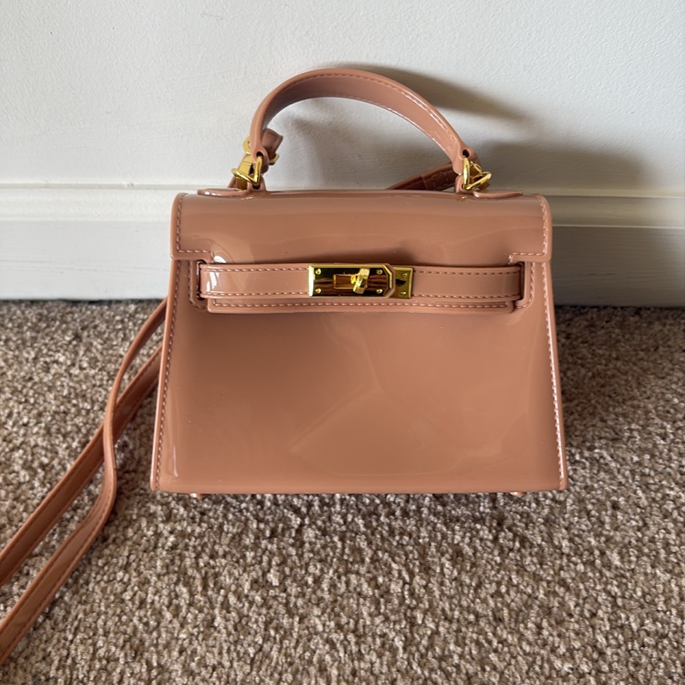 Small patent, tan bag; NWOT